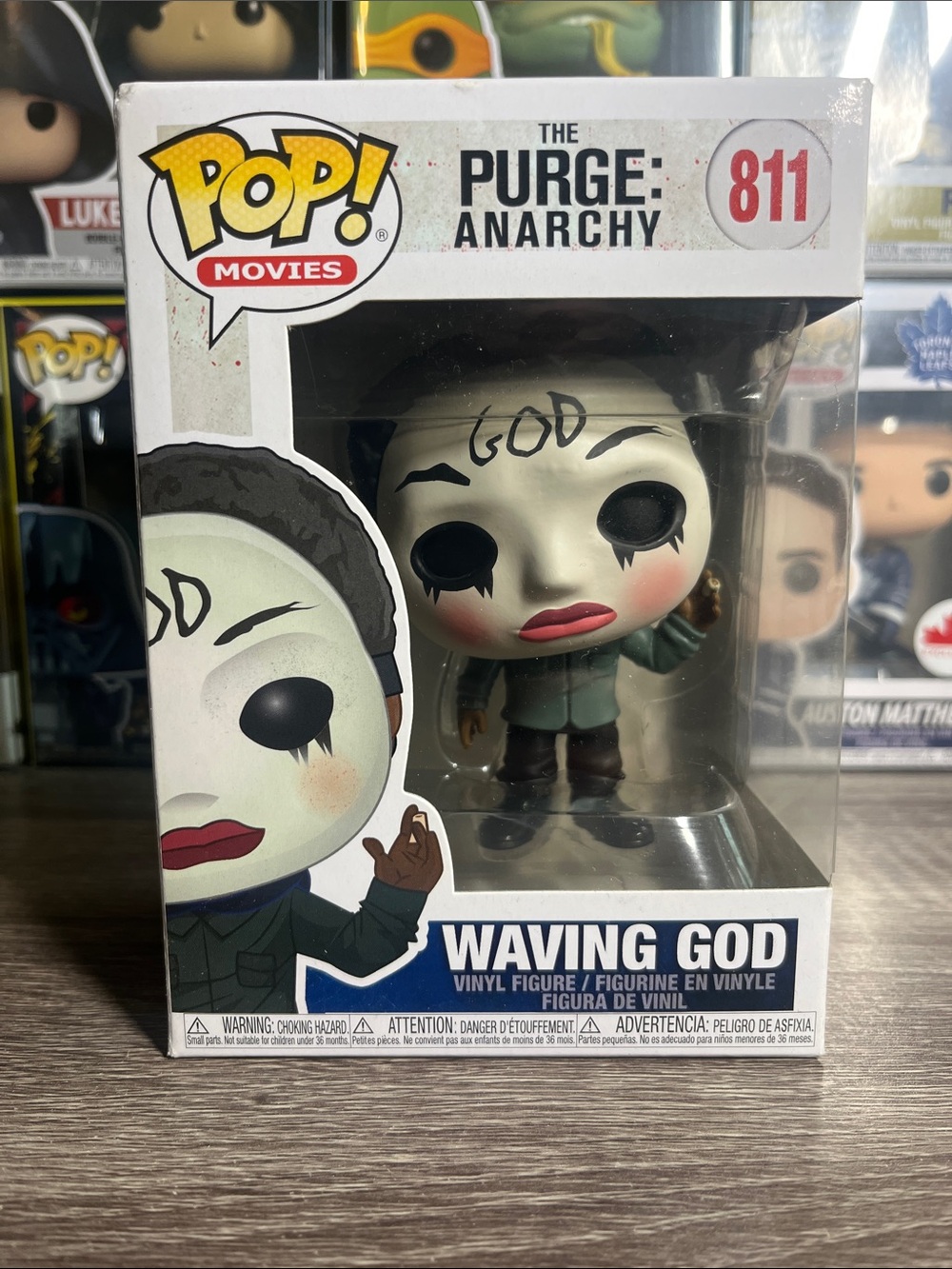 Funko Pop! Movies Waving God Vinyl Figure - White Mask, Black Eyes, Green Jacket